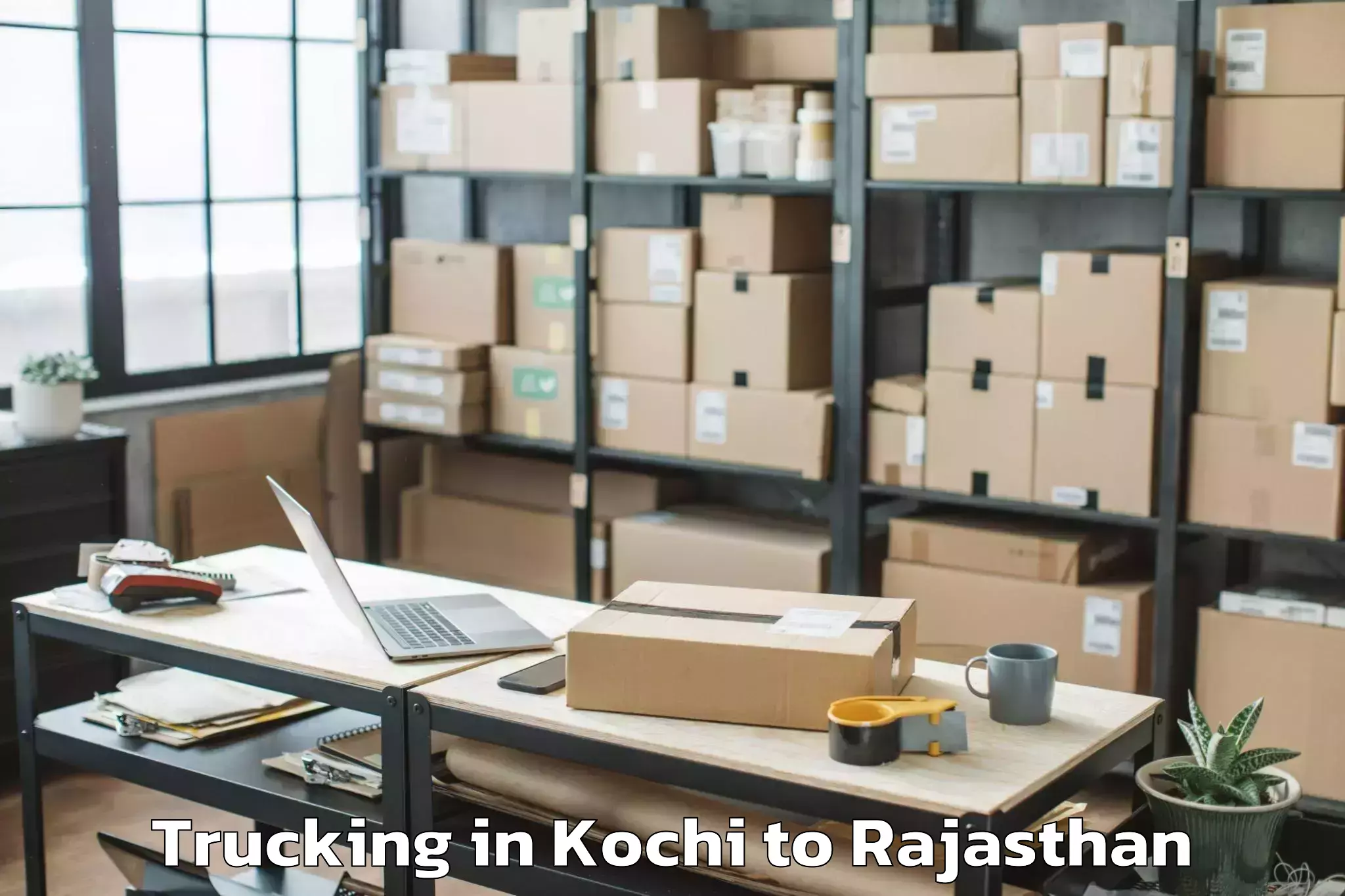 Easy Kochi to Sagwara Trucking Booking